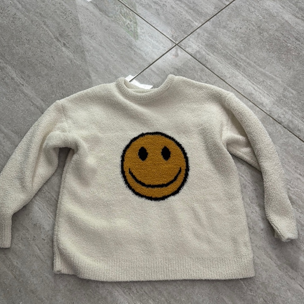 Cozy Cream Sweater with Smiley Design
